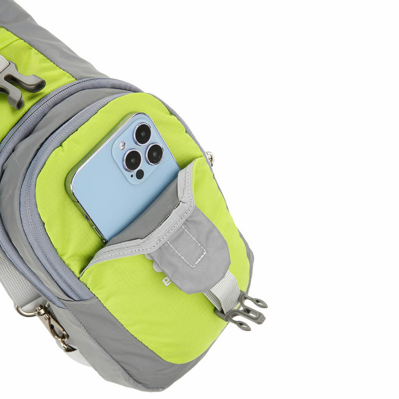 Laden Sie das Bild in Galerie -Viewer, Main compartment of the Riderbag green sling bag open with a smartphone and daily essentials inside