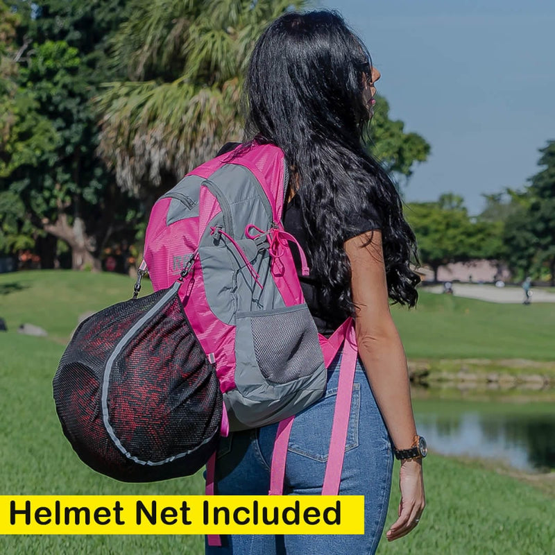 Load image into Gallery viewer, female biker wearing a helmet backpack riderbag
