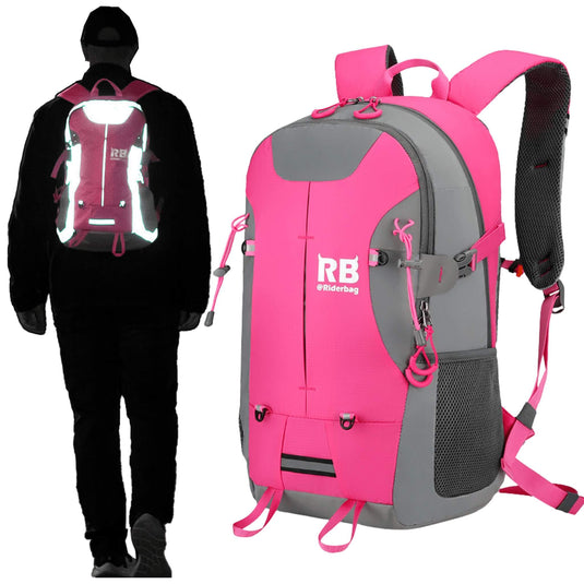 A pink and gray RB Racing backpack shown from the front and worn from the back by a person in black clothing. The backpack features multiple compartments, side mesh pockets, compression straps, and reflective pink details.