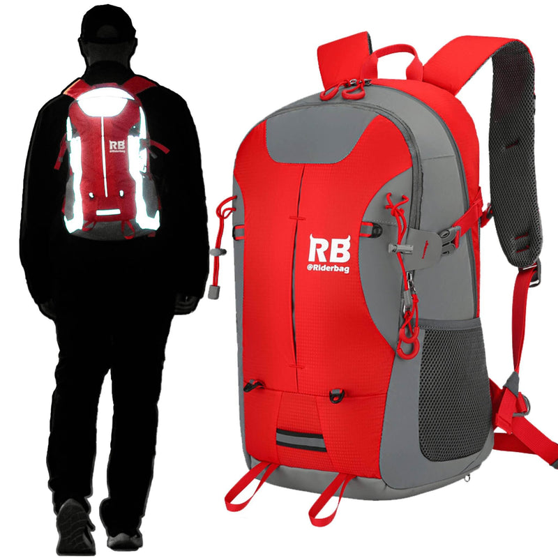 Cargue la imagen en el visor de la galería, Red and gray backpack shown from the front and worn from the back by a silhouetted person. The backpack has reflective white striping on the back, a visible RB Riderbag logo on the front, and multiple zip compartments and side mesh pockets.
